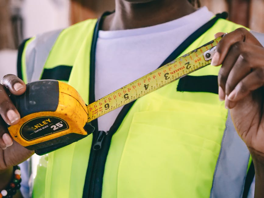 engineering surveying team using precision instruments for construction projects